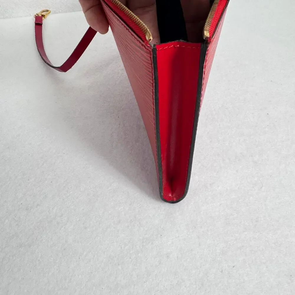 Louis Vuitton Epi Pochette Accessoires 24 Red wristlet gold hardware.